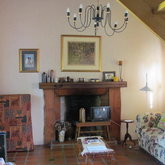 Relax in winter in front of this huge fireplace!